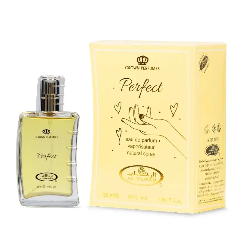 Een heldere glazen fles al-rehab parfum perfect eau de parfum met een goudkleurige spray en lichtgele vloeistof