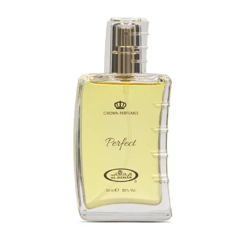 Een helder glazen parfumfles met goudkleurige spray en een kroonlogo, gevuld met zachtgele perfect van al-rehab crown perfumes