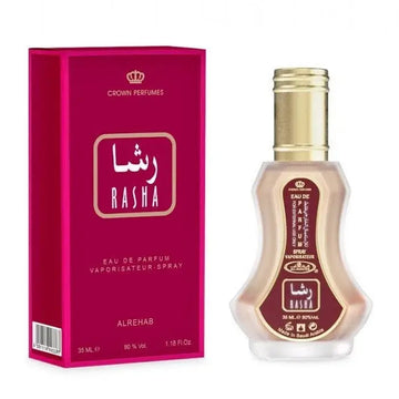 Een slanke transparante glazen fles met gouden dop en bordeauxrode etiketten van al-rehab parfum rasha eau de parfum