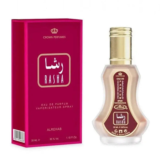 Een slanke transparante glazen fles met gouden dop en bordeauxrode etiketten van al-rehab parfum rasha eau de parfum