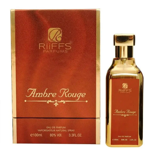 Een slanke goudkleurige glazen fles riffs parfums ambre rouge eau de parfum met bijpassende rode en gouden doos