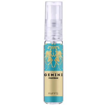 Een slanke doorzichtige glazen sprayfles met turkooizen en gouden label met engelachtige figuren van riiffs gemini pour femme edp 100 ml