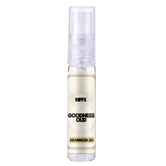 Clear glass spray bottle with white label black text gold accents brand riffs product goodness oud white edp 100 ml