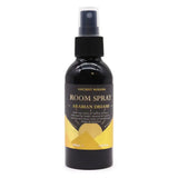 Zwarte glazen fles met zwarte spraydop en gouden label van ancient wisdom room spray arabian dreams