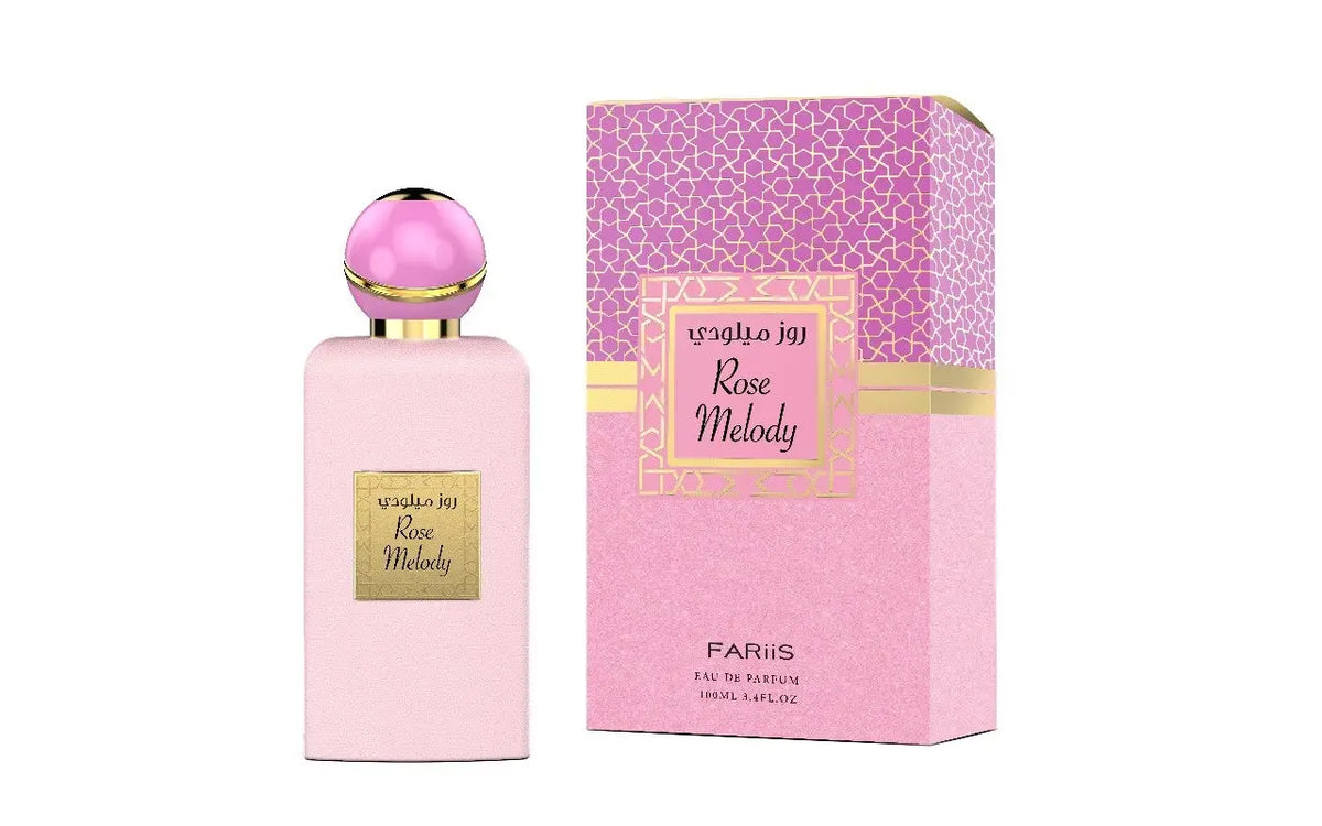 Roze rechthoekige parfumfles rose melody edp van fariis met glanzende roze bolvormige dop en gouden accenten