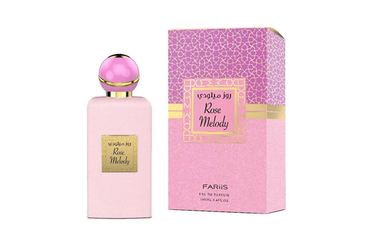 Roze rechthoekige parfumfles rose melody edp van fariis met glanzende roze bolvormige dop en gouden accenten