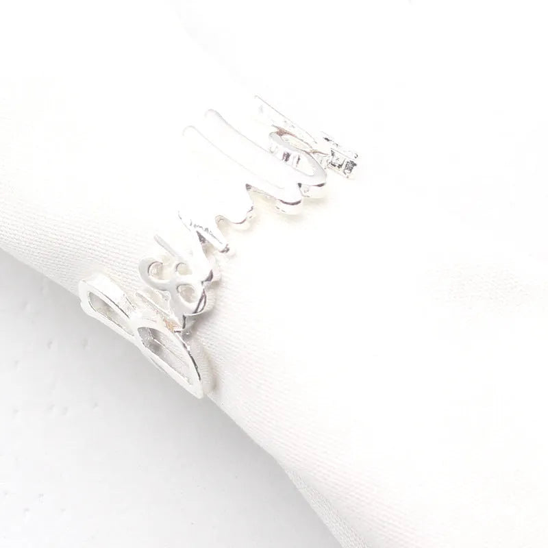 Zilveren schedel servetringen Bismillah set met 6 metalen servetringen