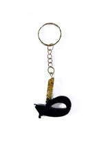 Zwarte acryl sleutelhanger t’aa met gouden glitters en zilveren metalen ring arabisch alfabet design