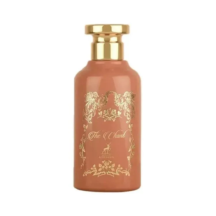 Ornate pink-coral parfumfles van The Chant Maison Alhambra met gouden details