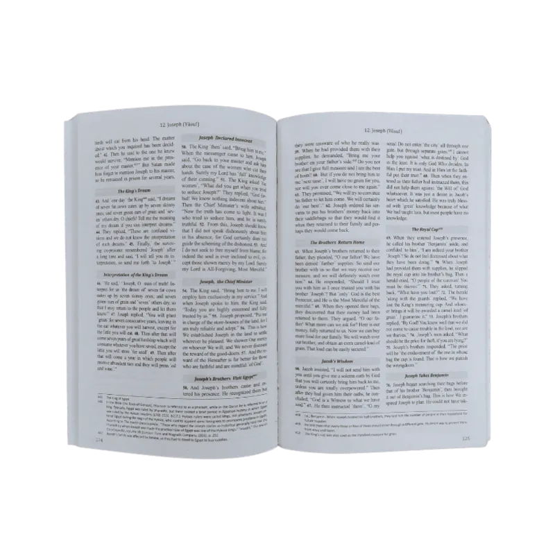 Open book with text pages showcasing The Clear Quran English only paperback medium