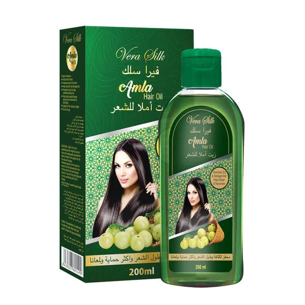 Groene fles en doos Vera Silk Hair Oil Amla 200 Ml met Arabische tekst en patronen