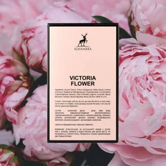 Zwartomlijnd productkaart van Victoria Flower Alhambra EDP met roze bloemenachtergrond